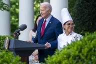 US President Joe Biden, with White House Chef Cristeta Comerford, delivers remarks during a reception celebrating Asian American, Native Hawaiian, and Pacific Islander Heritage Month in the Rose Garden the White House in Washington, DC, USA, 13 May 2024