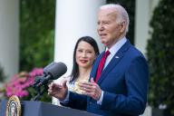 US President Joe Biden, with American actress Lucy Liu, delivers remarks during a reception celebrating Asian American, Native Hawaiian, and Pacific Islander Heritage Month in the Rose Garden the White House in Washington, DC, USA, 13 May 2024