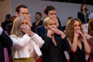 Judith Godreche (center) and her daughter Tess Barthelemy (right) cover their mouth in a âMe Tooâ in French cinema action, as they attend the screening of Mad Max âFuriosaâ, as part of 77th edition of Cannes Film Festival, in Cannes, France, on May 15, 2024. Photo by Ammar Abd Rabbo/ABACAPRESS