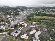 Aerial view of RiviÃ¨re SalÃe, with the media library still on fire in Noumea, New Caledonia on May 19, 2024. Photo by ABACAPRESS
