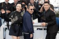 Jia Zhangke, Zhao Tao and Zhou You attend the Caught By The Tides Photocall at the 77th annual Cannes Film Festival at Palais des Festivals on May 19, 2024 in Cannes, France. Photo by David NIVIERE ABACAPRESS