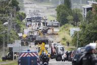 French police forces removing the blockage on rue IÃkawÃ of Noumea on June 1, 2024. Photo by MMIIAS/ABACAPRESS