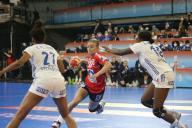 Stine Bredal Oftedal of Norway and Estelle Nze Minko , GrÃ¢ce Zaadi of France during the IHF Women
