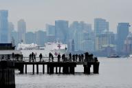 .March 30, 2020 New York City..Crowds watch the USNS Comfort as it arrives to New York City during the novel coronavirus disease (COVID-19) outbreak on March 30, 2020 in New York City...Credit: Kristin Callahan/ACE Pictures..Tel:Email: