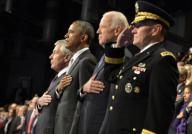 United States President Barack Obama (2nd,L) joins outgoing Secretary of Defense Chuck Hagel (L), Vice President Joe Biden (2nd,R) and Chairman of the Joint Chiefs of Staff Martin Dempsey as they attend the Armed Forces Farewell Tribute for Hagel, ...