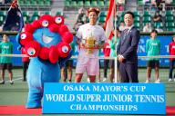 (L-R) MYAKU-MYAKU, Joel Schwaerzler (AUT), Hideyuki Yokoyama Mayor Of Osaka (JPN), October 15, 2023 - Tennis : Boys Singles Victory Ceremony at ITC Utsubo Tennis Center during Osaka Mayor