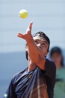 MADRID, SPAIN - APRIL 24: Taro Daniel of Japon returns the ball during their match against Aleksandar Vukic on Day 3 of the Mutua Madrid Open at Caja Magica Stadium in Madrid.(Photo by Guille Martinez\/AFLO