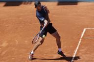 MADRID, SPAIN - APRIL 24: Taro Daniel of Japon returns the ball during their match against Aleksandar Vukic on Day 3 of the Mutua Madrid Open at Caja Magica Stadium in Madrid.(Photo by Guille Martinez\/AFLO