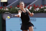 MADRID, SPAIN - APRIL 24: Sara Errani returns a shot against Caroline Wozniacki during their match on Day 3 of the Mutua Madrid Open at Caja Magica Stadium in Madrid.(Photo by Guille Martinez\/AFLO
