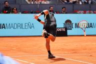 Yoshihito Nishioka (JPN), APRIL 25, 2024 - Tennis : Yoshihito Nishioka is so upset about a misplay that he slams his racket down on the court in frustration during singles round of 128 match against Felix Auger-Aliassime on the ATP tour Masters 1000 "Mutua Madrid Open tennis tournament" at the Caja Magica in Madrid, Spain. (Photo by Mutsu Kawamori\/AFLO