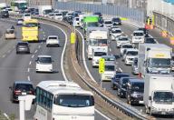 May 3, 2024, Tokyo, Japan - Motorists are caught in a traffic jam along a highway in Tokyo at a week-long Golden Week holidays on Friday, May 3. (photo by Yoshio Tsunoda\/AFLO