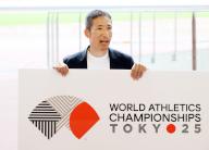 May 13, 2024, Tokyo, Japan - Japanese designer Ryo Nakagawa displays the logo mark of World Athletics Championships Tokyo 2025 at Japan
