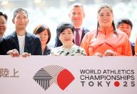May 13, 2024, Tokyo, Japan - (L-R) Japanese designer Ryo Nakagawa, Tokyo Governor Yuriko Koike and javelin throw world champion Haruka Kitaguchi display the logo mark of World Athletics Championships Tokyo 2025 at Japan