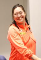 May 13, 2024, Tokyo, Japan - javelin throw world champion Haruka Kitaguchi smiles as she displays the logo mark of World Athletics Championships Tokyo 2025 at Japan