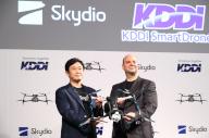 May 13, 2024, Tokyo, Japan - KDDI executive officer Hiromichi Matsuda (L) and Skydio Japan president Tom Moss (R) pose for photo as Japan
