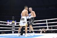 Jason Moloney (white gloves) of Australia and Yoshiki Takei (blue gloves) of Japan compete during their WBO world bantamweight title boxing bout at Tokyo Dome in Tokyo, Japan on May 6, 2024. (Photo by Hiroaki Finito Yamaguchi/AFLO
