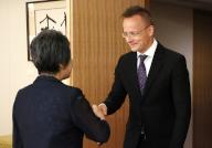 May 21, 2024, Tokyo, Japan - Hungarian Foreign and Trade Minister Peter Szijjarto (R) shakes hands with Japanese Foreign Minister Yoko Kamikawa (L) prior to their talks at Kamikawa