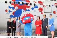 June 2, 2024, Tokyo, Japan - Japan Airlines (JAL) president Mitsuko Tottori (3rd L) and World Expo Minister Hanako Jimi (3rd R) pose for photo with Myaku-Myaku (C), mascot of the 2025 World Expo Osaka\/Kansai before JAL\'s Myaku-Myaku jet designed with Myaku-Myaku at the JAL hangar of the Haneda airport in Tokyo on Sunday, June 2, 2024. The new Myaku-Myaku jet will serve for the international route from June 3, while the first one was launched for the domestic route last year. (photo by Yoshio Tsunoda\/AFLO