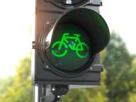 Bicycle green signal on traffic light. Free bike road or zone for bikes. Bike friendly politics concept. Sustainable transport. 3d illustration