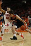 Virginia Cavaliers guard Ty Jerome (11) tries to drive past Clemson Tigers guard Avry Holmes (12) on January 14, 2017. Mandatory Photo Credit: Vern Verna / Ai Wire