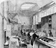 Espionage. England: men of the “Secret Office” sifting through suspicious correspondence in a back room of the London main post office (standing, an agent transcribing). Woodcut, unsigned, 1845. Frankfurt am Main, Museum for Communication.