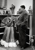 Circa 1945: Frida Kahlo with his husband the Mexican artist Diego Rivera in her studio in Mexico City.Circa 1945: Frida Kahlo with his husband the Mexican artist Diego Rivera in her studio in Mexico City.. Album. . 