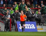 2nd April 2023; Victoria Park, Dingwall, Scotland: Scottish Premiership Football, Ross County versus Celtic; Referee Willie Collum points to the penalty spot after a VAR check and awards a penalty to