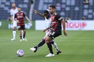 11th November 2023; CommBank Stadium, Sydney, NSW, Australia; A-League Football, Western Sydney Wanderers versus Perth Glory; Tate Russell of Western Sydney Wanderers passes the ball under pressure from Bruce Kamau of Perth