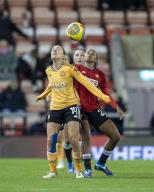 14th December 2023; Leigh Sports Village, Manchester, England; FA Womens League Cup Football, Manchester United versus Leicester City; Josie Green of Leicester City Women and Geyse of Manchester United Women challenge for a