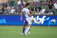 6th January 2024; HBF Park, Perth, Western Australia, Australia; A-League Football, Perth Glory versus Melbourne Victory; Fabian Andres Monge of Melbourne Victory tries to block the shot from Bruce Kamau of Perth