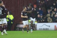 23rd January 2024; Tynecastle Park, Edinburgh, Scotland: Scottish Premiership Football, Hearts versus Dundee; Dexter Lembikisa of Heart of Midlothian is congratulated after scoring for 2-2 by Yutaro Oda in the 74th