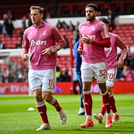 13th April 2024; The City Ground, Nottingham, England; Premier League Football, Nottingham Forest versus Wolverhampton Wanderers; Chris Wood and Andrew Omobamidele during the pre-match warm