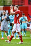 13th April 2024; The City Ground, Nottingham, England; Premier League Football, Nottingham Forest versus Wolverhampton Wanderers; Chris Wood of Nottingham Forest applauds the home fans after the final