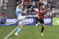 20th April 2024; CommBank Stadium, Sydney, NSW, Australia: A-League Football, Western Sydney Wanderers versus Melbourne City; Jimmy Jeggo of Melbourne City clears the ball under pressure from Joshua Brillante of Western Sydney