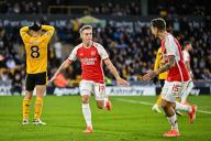 20th April 2024; Molineux Stadium, Wolverhampton, West Midlands, England; Premier League Football, Wolverhampton Wanderers versus Arsenal; Leandro Trossard of Arsenal celebrates with Jakub Kiwior after scoring the opening goal in the 45th minute for 0