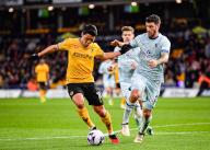 24th April 2024; Molineux Stadium, Wolverhampton, West Midlands, England; Premier League Football, Wolverhampton Wanderers versus Bournemouth; Hwang Hee-chan of Wolves takes on Marcos Senesi of AFC