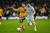 24th April 2024; Molineux Stadium, Wolverhampton, West Midlands, England; Premier League Football, Wolverhampton Wanderers versus Bournemouth; Lewis Cook of AFC Bournemouth looks to beat Rayan Ait-Nouri of