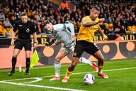 24th April 2024; Molineux Stadium, Wolverhampton, West Midlands, England; Premier League Football, Wolverhampton Wanderers versus Bournemouth; Mario Lemina of Wolves holds off Adam Smith of AFC
