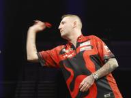 25th April 2024, M&amp;S Bank Arena, Liverpool, England; 2024 PDC Premier League Darts Liverpool Night 13; Slow motion shot of Nathan Aspinall in his semi-final match against Luke Littler