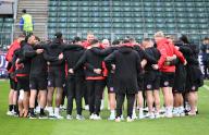 26th April 2024, The Recreation Ground, Bath, Somerset, England; Gallagher Premiership Rugby, Bath versus Saracens; Saracens team huddle on the pitch after arriving at the