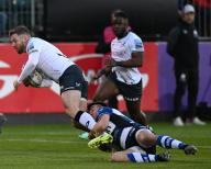 26th April 2024, The Recreation Ground, Bath, Somerset, England; Gallagher Premiership Rugby, Bath versus Saracens; Will Muir of Bath tackles Elliot Daly of
