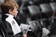 27th April 2024; Craven Cottage, Fulham, London, England; Premier League Football, Fulham versus Crystal Palace; young Fulham fan waits for kick