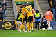 27th April 2024; Molineux Stadium, Wolverhampton, West Midlands, England; Premier League Football, Wolverhampton Wanderers versus Luton Town; Toti Gomes celebrates with Matheus Cunha of Wolves after heading past Thomas Kaminski in the Luton Town goal in the 50th minute for 2
