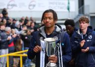 27th April 2024; The Den, Bermondsey, London, England; EFL Championship Football, Millwall versus Plymouth Argyle; Millwall under-18 captain Josh Stephenson poses with the Under-18 Premier League trophy while walking around The Den Stadium at half