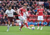 28th April 2024; The City Ground, Nottingham, England; Premier League Football, Nottingham Forest versus Manchester City; Chris Wood of Nottingham Forest competes for the ball with Rodrigo of Manchester