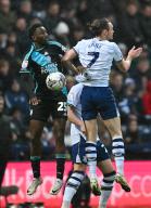 29th April 2024; Deepdale, Preston, England; EFL Championship Football, Preston North End versus Leicester City; Wilfred Ndidi of Leicester challenges Will Keane of Preston for the high
