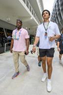 2nd May 2024; Miami International Autodrome, Miami, Florida, USA; Formula 1 Crypto.com Miami Grand Prix 2024; Arrival and Inspection Day; Miami Dolphins linebacker Jaelan Phillips walks in the paddock with Miami Dolphins football communications manager Renzo Sheppard