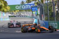 3rd May 2024; Miami International Autodrome, Miami, Florida, USA; Formula 1 Crypto.com Miami Grand Prix 2024; Free Practice Day; Sparks fly as Oscar Piastri of Australia drives the number 81 McLaren ahead of Kevin Magnussen of Denmark driving the number 20 MoneyGram Haas car during the Sprint qualifying session