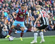 4th May 2024; Turf Moor, Burnley, Lancashire, England; Premier League Football, Burnley versus Newcastle United; Lewis Hall of Newcastle pressures Lorenz Assignon of