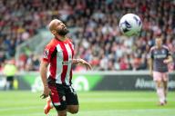 4th May 2024; Gtech Community Stadium, Brentford, London, England; Premier League Football, Brentford versus Fulham; Bryan Mbeumo of Brentford reacts as he misses the ball